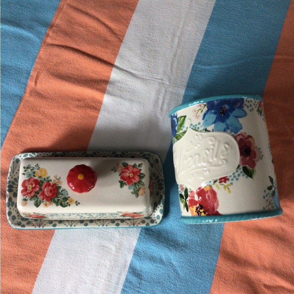 Set of Pioneer Woman butter dish and utensil holder.